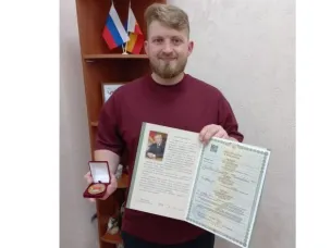 В день 86-летия Ростовской области в отделе ЗАГС вручали свидетельство о рождении молодым родителям